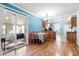 Bright dining area next to the kitchen with access to a sunroom through sliding glass doors at 113 Surrey Dr, Summerville, SC 29486