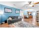 Inviting living room with hardwood floors and easy access to the kitchen and backyard at 113 Surrey Dr, Summerville, SC 29486