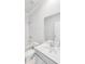 Bright bathroom featuring a tub-shower combo, large mirror, and modern sink at 114 Orchard Blossom Ln, Summerville, SC 29485