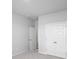 Bedroom with double door closet and neutral colored walls and carpet at 114 Orchard Blossom Ln, Summerville, SC 29485