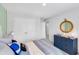 Serene bedroom featuring a comfortable bed, soft bedding, and ample closet space at 114 Orchard Blossom Ln, Summerville, SC 29485