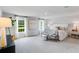 Spacious main bedroom featuring large windows and a decorative bench at 114 Orchard Blossom Ln, Summerville, SC 29485