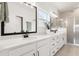 Modern bathroom with dual sinks, white cabinets, and a glass-enclosed shower at 115 Winding Branch Dr, Summerville, SC 29486