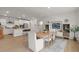 Open concept with kitchen and dining area showcasing an abundance of natural light at 1150 Cooper Point St, Summerville, SC 29485