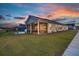 Charming single-Gathering home with a cozy, screened-in porch and meticulously maintained lawn at 1150 Cooper Point St, Summerville, SC 29485