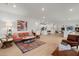 Open concept living room with a fireplace and lots of natural light at 1150 Cooper Point St, Summerville, SC 29485