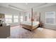 Bright and airy main bedroom with lots of natural light and a four poster bed at 1150 Cooper Point St, Summerville, SC 29485