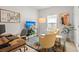 Office space featuring a wooden desk, comfortable chairs, and natural light at 1150 Cooper Point St, Summerville, SC 29485