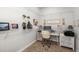 Bright office space with desk, white shelving, decor, and a motivational sign at 1150 Cooper Point St, Summerville, SC 29485