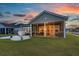 Enjoy outdoor living on this home's screened porch with a beautiful sunset view at 1150 Cooper Point St, Summerville, SC 29485