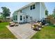 Beautiful backyard patio with comfortable seating, perfect for outdoor relaxation and entertaining at 1164 Sharpestowne Ct, Mount Pleasant, SC 29466