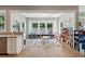 Sunlit playroom with ample windows, natural light, and space for to play at 1164 Sharpestowne Ct, Mount Pleasant, SC 29466