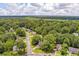 Aerial view of the home showcasing its position in a tree-filled residential neighborhood at 117 Berringer Dr, Goose Creek, SC 29445