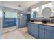 Stylish bathroom featuring a walk-in shower, double vessel sinks, and modern fixtures at 117 Berringer Dr, Goose Creek, SC 29445