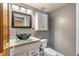 Contemporary bathroom featuring a vessel sink, vanity, framed mirror, and a toilet at 117 Berringer Dr, Goose Creek, SC 29445