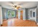 Bedroom with hardwood floors, ceiling fan, natural light from the windows and two closets at 117 Berringer Dr, Goose Creek, SC 29445