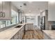 Renovated kitchen boasts granite countertops, stainless steel appliances, and ample cabinet space at 117 Berringer Dr, Goose Creek, SC 29445