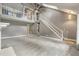 Bright, spacious living room with a fireplace, vaulted ceilings, and open stairway at 117 Berringer Dr, Goose Creek, SC 29445