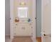 Cozy bathroom featuring a vanity with a mirrored cabinet and neutral decor at 1211 Meadow Park Ln # B, Mount Pleasant, SC 29464