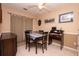 Relaxing dining space with natural light, neutral walls, and classic wood furniture at 1211 Meadow Park Ln # B, Mount Pleasant, SC 29464