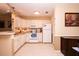 Functional kitchen with white appliances and ample cabinet space at 1211 Meadow Park Ln # B, Mount Pleasant, SC 29464