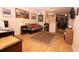 Cozy living room featuring wood floors, a futon, and decorative artwork at 1211 Meadow Park Ln # B, Mount Pleasant, SC 29464