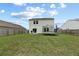 Expansive backyard with fencing, trampoline, and patio area ideal for entertaining at 123 Lyra Ln, Summerville, SC 29486