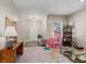 Bright living room showcasing neutral tones and ample natural light from a nearby window at 123 Lyra Ln, Summerville, SC 29486