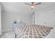 Relaxing bedroom with a decorative ceiling fan, large bed, and storage chest at 135 Cypress Preserve Blvd, Moncks Corner, SC 29461