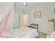Cozy bedroom with light walls, plush rug, and a delightful canopy bed for comfort and style at 135 Cypress Preserve Blvd, Moncks Corner, SC 29461