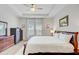 Comfortable bedroom with tray ceiling, natural light, and calming decor elements throughout at 135 Cypress Preserve Blvd, Moncks Corner, SC 29461