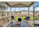 Relaxing screened-in porch offering peaceful outdoor seating and backyard views at 135 Cypress Preserve Blvd, Moncks Corner, SC 29461