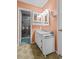 Bathroom with modern white vanity, open doorway into a shower, and neutral tones at 1351 Winifred St, Mount Pleasant, SC 29464