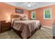A cozy bedroom with lots of light and neutral toned carpet and walls at 1351 Winifred St, Mount Pleasant, SC 29464
