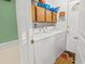 Bright laundry room with modern appliances and lots of storage at 1351 Winifred St, Mount Pleasant, SC 29464