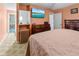 The main bedroom features an ensuite bathroom, TV, and comfortable decor, creating a relaxing retreat at 1351 Winifred St, Mount Pleasant, SC 29464
