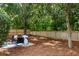 Relaxing backyard featuring a cozy seating area and a classic wooden fence at 1420 Wellesley Cir, Mount Pleasant, SC 29466