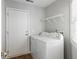 Functional laundry room with side by side washer and dryer, and storage at 1420 Wellesley Cir, Mount Pleasant, SC 29466