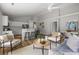 Spacious living area featuring a breakfast bar, vaulted ceilings, and an open floor plan at 1420 Wellesley Cir, Mount Pleasant, SC 29466