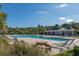 Large community pool with ample lounge chairs and a shaded picnic area at 1420 Wellesley Cir, Mount Pleasant, SC 29466