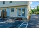 Building back with parking area and small porch with double glass doors at 1423 Ashley River Rd # 3A, Charleston, SC 29407