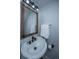 Modern bathroom with a stylish sink, wooden-framed mirror, and sleek fixtures for a contemporary feel at 1423 Ashley River Rd # 3A, Charleston, SC 29407