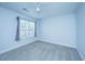 Bright and spacious bedroom with plush carpet and large window with privacy blinds at 1423 Ashley River Rd # 3A, Charleston, SC 29407