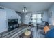 Cozy living room with plush seating, modern entertainment setup, and inviting decor, great for relaxing evenings at 1423 Ashley River Rd # 3A, Charleston, SC 29407