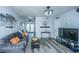 Open living space with sleek furniture, wood-style flooring, and seamless transition to other areas of the home at 1423 Ashley River Rd # 3A, Charleston, SC 29407