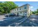 Townhome building with parking area and parking spot for each unit at 1423 Ashley River Rd # 3A, Charleston, SC 29407