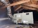 Attic featuring an HVAC unit and exposed wooden beams, perfect for efficient temperature control at 1488 Remount Rd, North Charleston, SC 29406