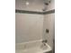 Clean and modern bathroom featuring tiled walls, and modern fixtures at 1488 Remount Rd, North Charleston, SC 29406