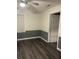 Cozy bedroom with a ceiling fan, dark vinyl floors and modern wall trim at 1488 Remount Rd, North Charleston, SC 29406