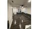Spacious living room with dark vinyl floors and contemporary wall trim at 1488 Remount Rd, North Charleston, SC 29406